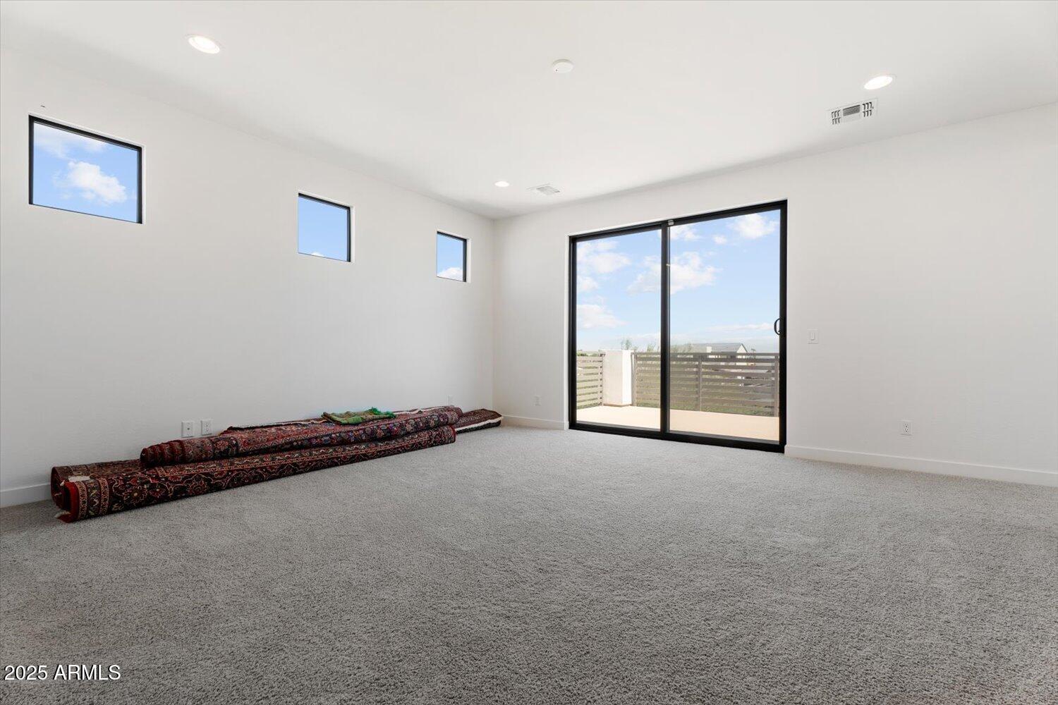 816 East Monte Way Phoenix, AZ 85042 - Photo 17 of 35 an empty room with windows