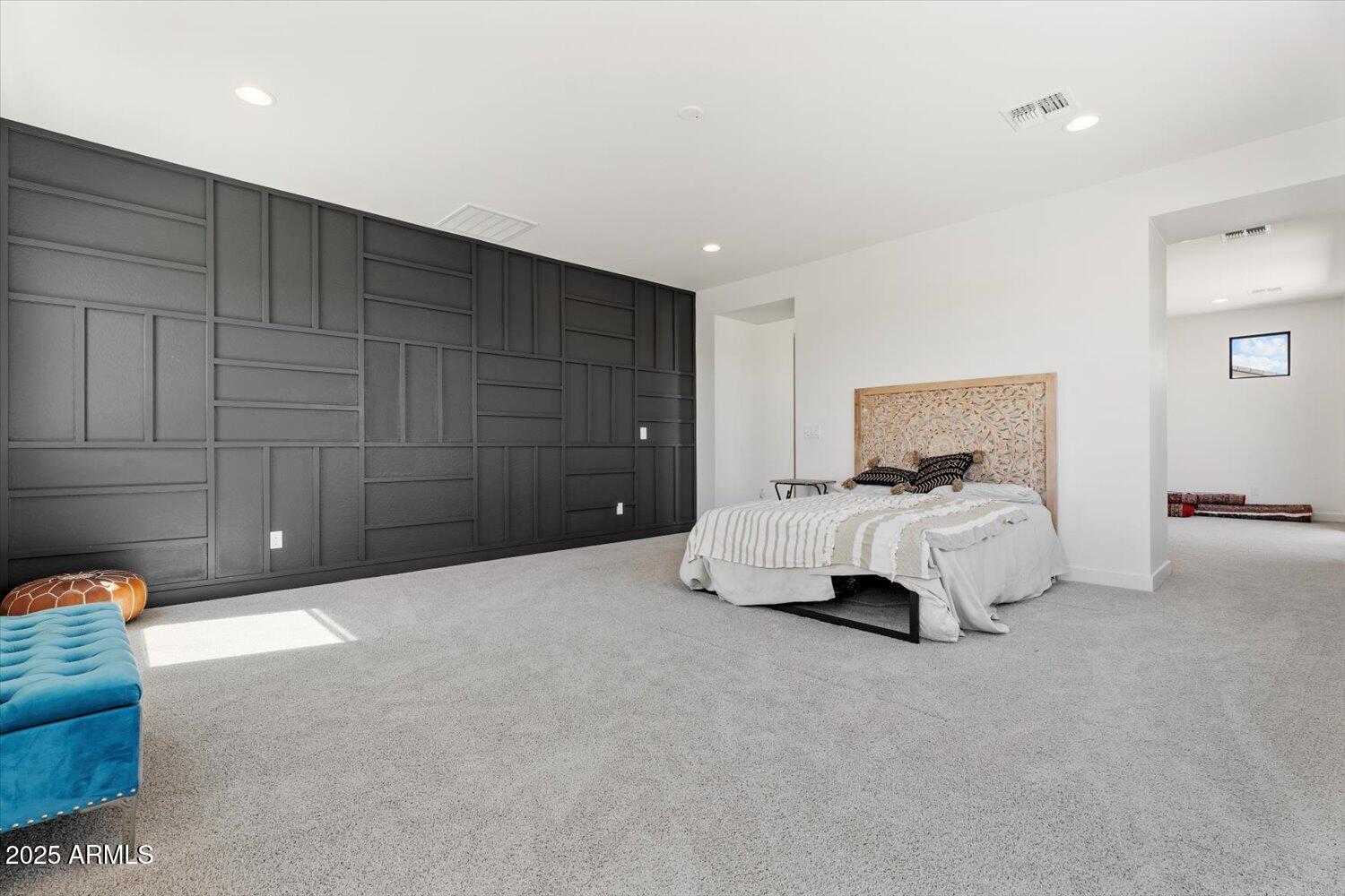 816 East Monte Way Phoenix, AZ 85042 - Photo 22 of 35 a bedroom with a bed and a night stand