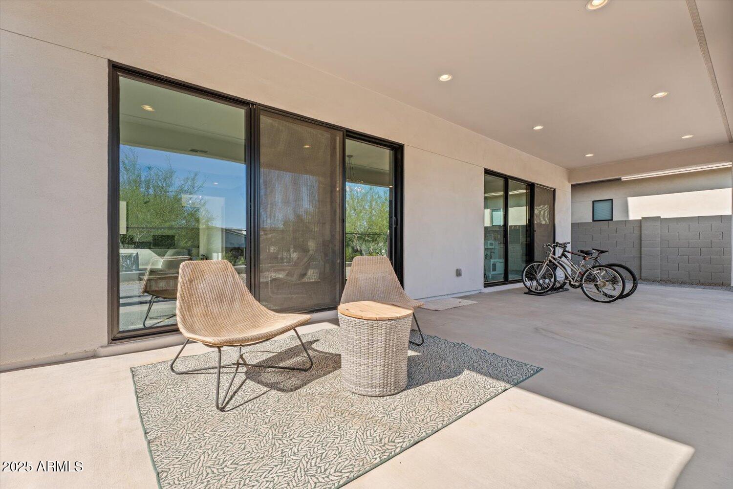 816 East Monte Way Phoenix, AZ 85042 - Photo 29 of 35 a building outdoor space with patio furniture and potted plants