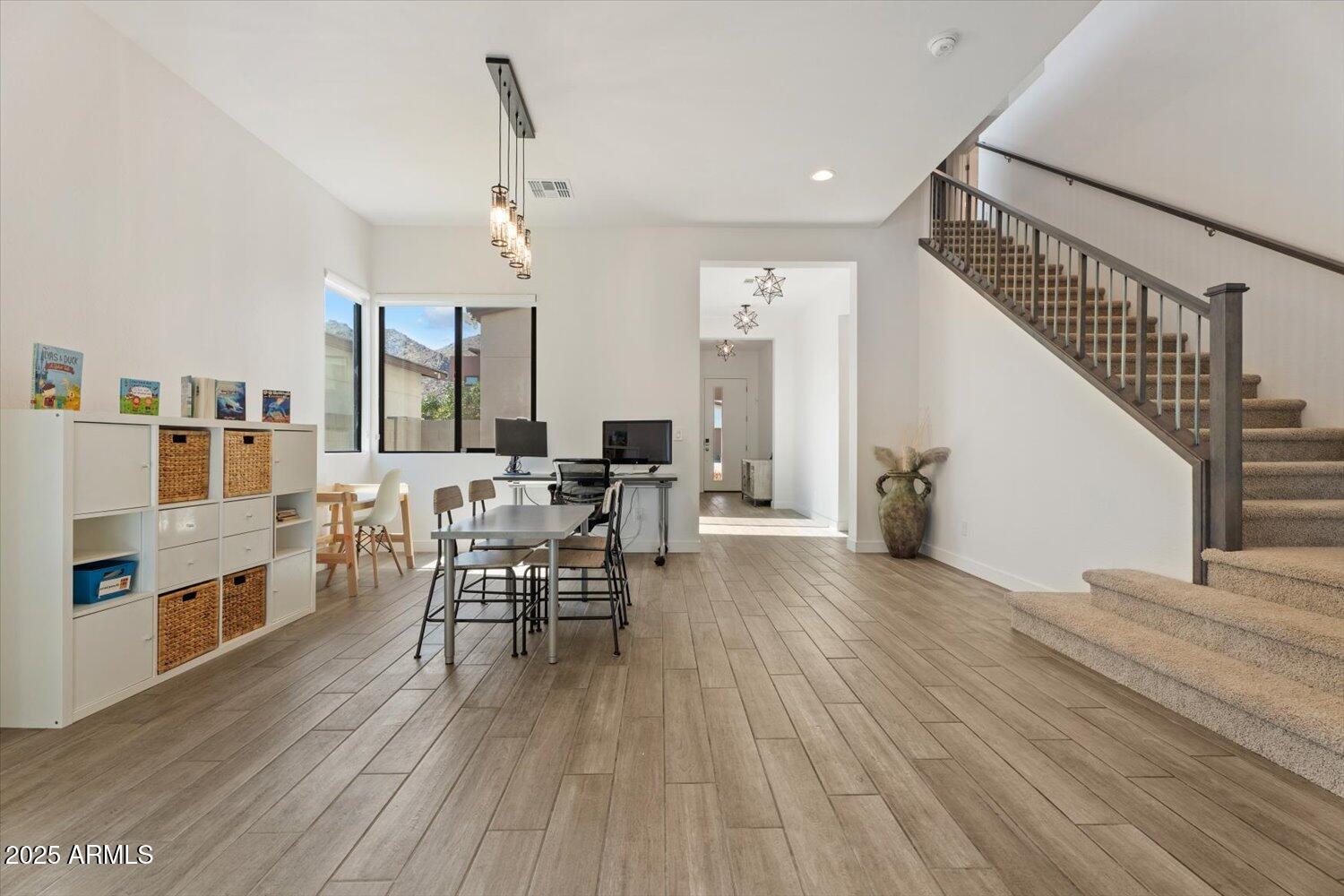 816 East Monte Way Phoenix, AZ 85042 - Photo 3 of 35 a living room with furniture and wooden floor