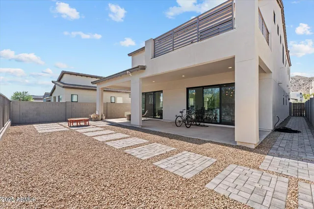 a view of a swimming pool with a yard
