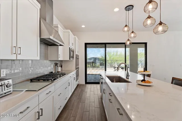a kitchen with counter space cabinets and appliances