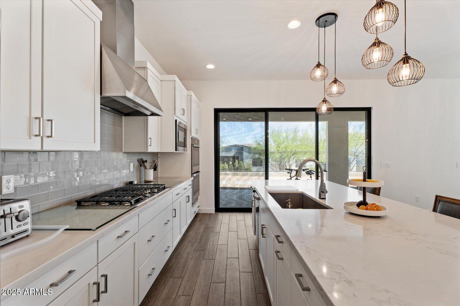 816 East Monte Way Phoenix, AZ 85042 - Photo 10 of 35 a kitchen with counter space cabinets and appliances