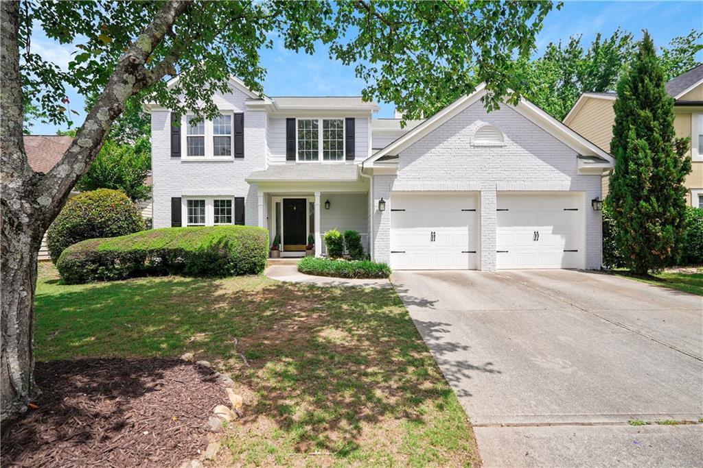 2480 Cogburn Ridge Road Alpharetta, GA 30004 - Photo 1 of 1 a view of a yard in front of house