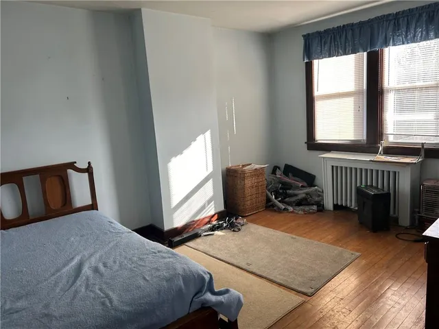 a bathroom with a shower and a bathtub
