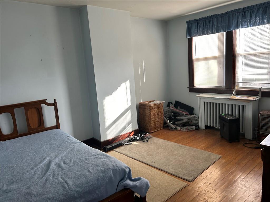 301 Meredith Street Pittsburgh, PA 15210 - Photo 15 of 30 a bedroom with furniture and a window