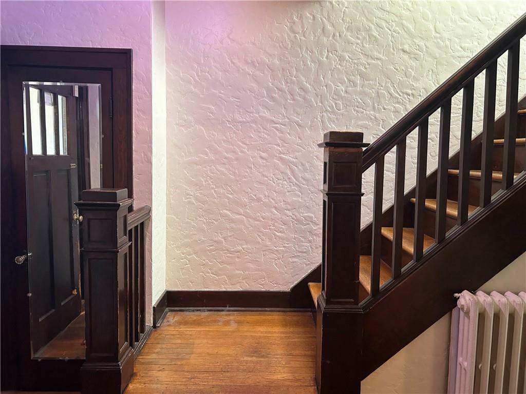 301 Meredith Street Pittsburgh, PA 15210 - Photo 2 of 30 a view of staircase with railing and a window