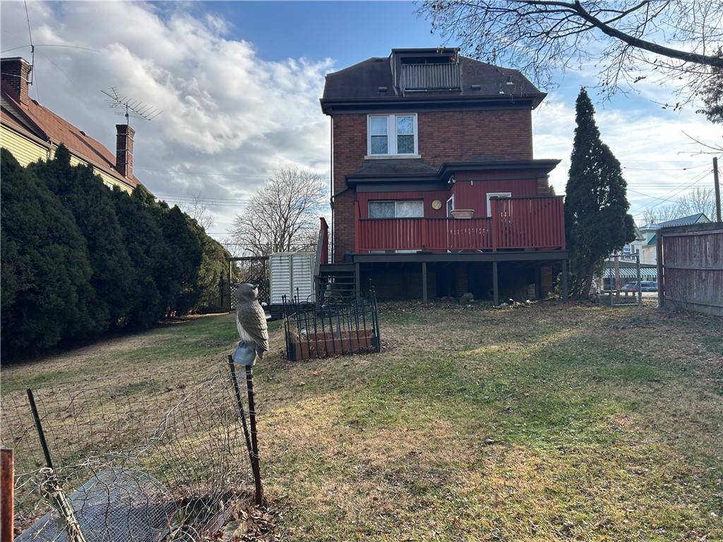 301 Meredith Street Pittsburgh, PA 15210 - Photo 24 of 30 a front view of a house with garden