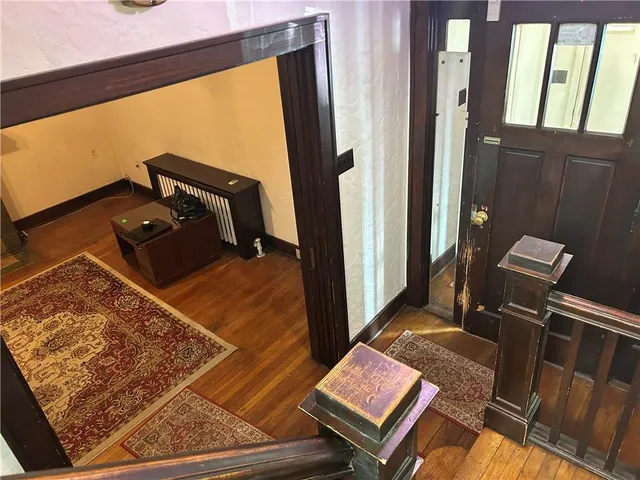 a living room with rug