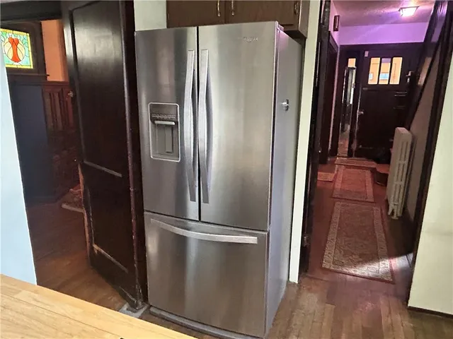 a kitchen with a sink stove and microwave