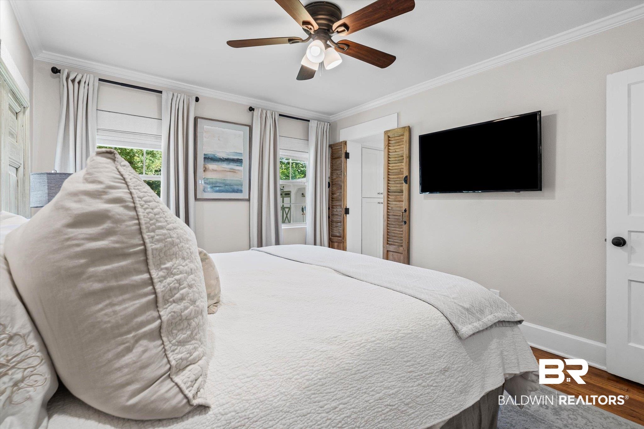 4310 The Cedars Avenue Mobile, AL 36608 - Photo 14 of 32 Bedroom featuring crown molding, wood finished floors, and a ceiling fan