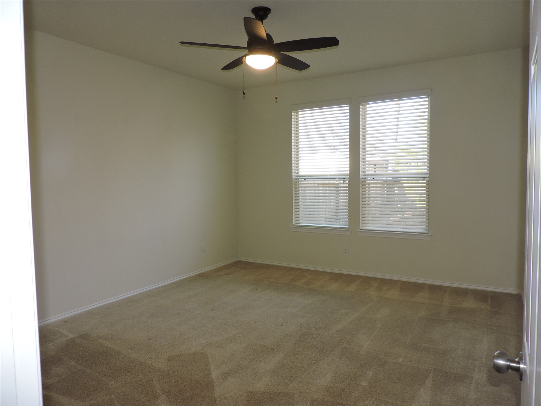 4022 Timber Sapp Drive Conroe, TX 77304 - Photo 18 of 35 Downstairs Primary Bedroom