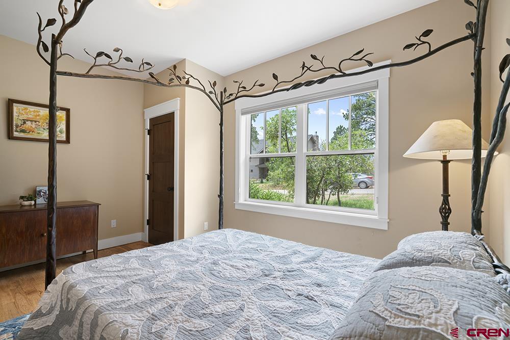 322 Window Lake Trail Durango, CO 81301 - Photo 11 of 35 a bedroom with a bed and a window