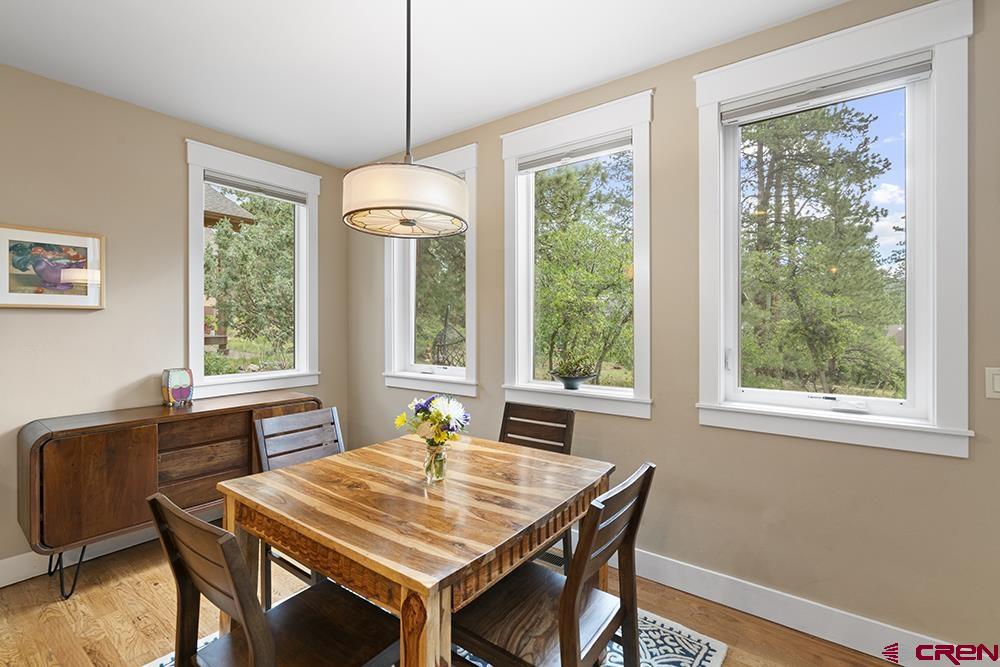 322 Window Lake Trail Durango, CO 81301 - Photo 18 of 35 a view of a dining room with furniture window and outside view