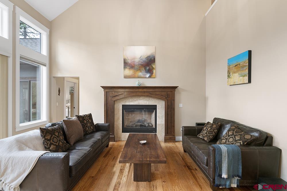 322 Window Lake Trail Durango, CO 81301 - Photo 19 of 35 a living room with furniture and a fireplace