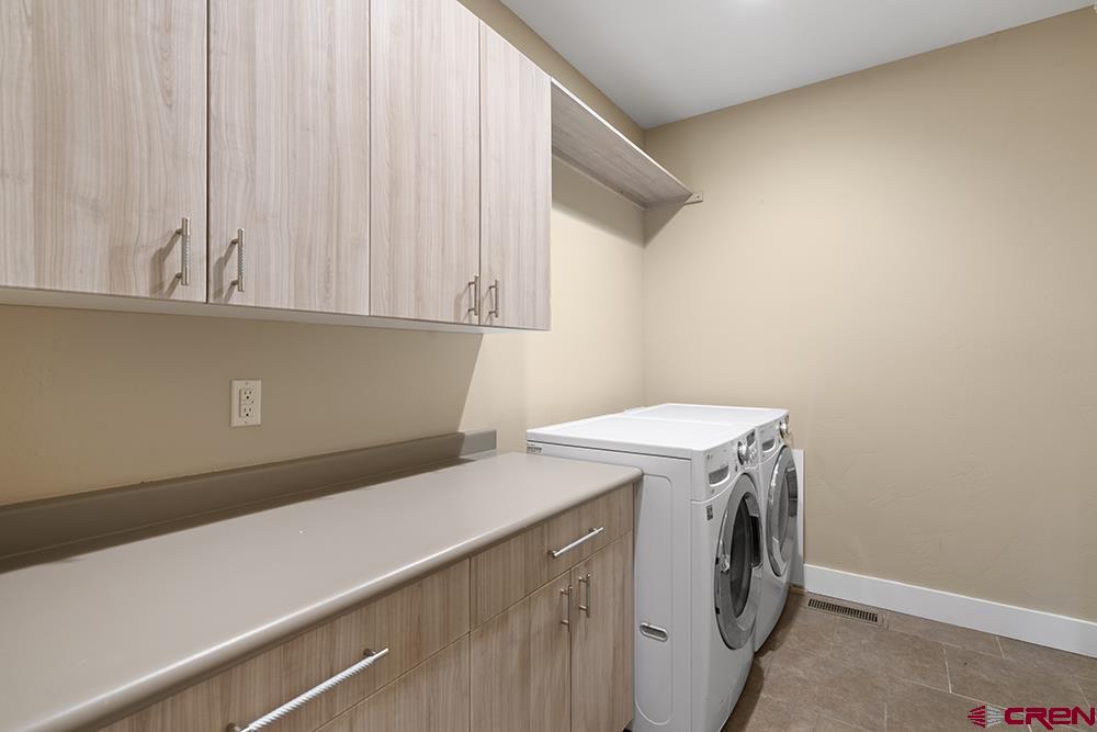 322 Window Lake Trail Durango, CO 81301 - Photo 22 of 35 a utility room with dryer and washer