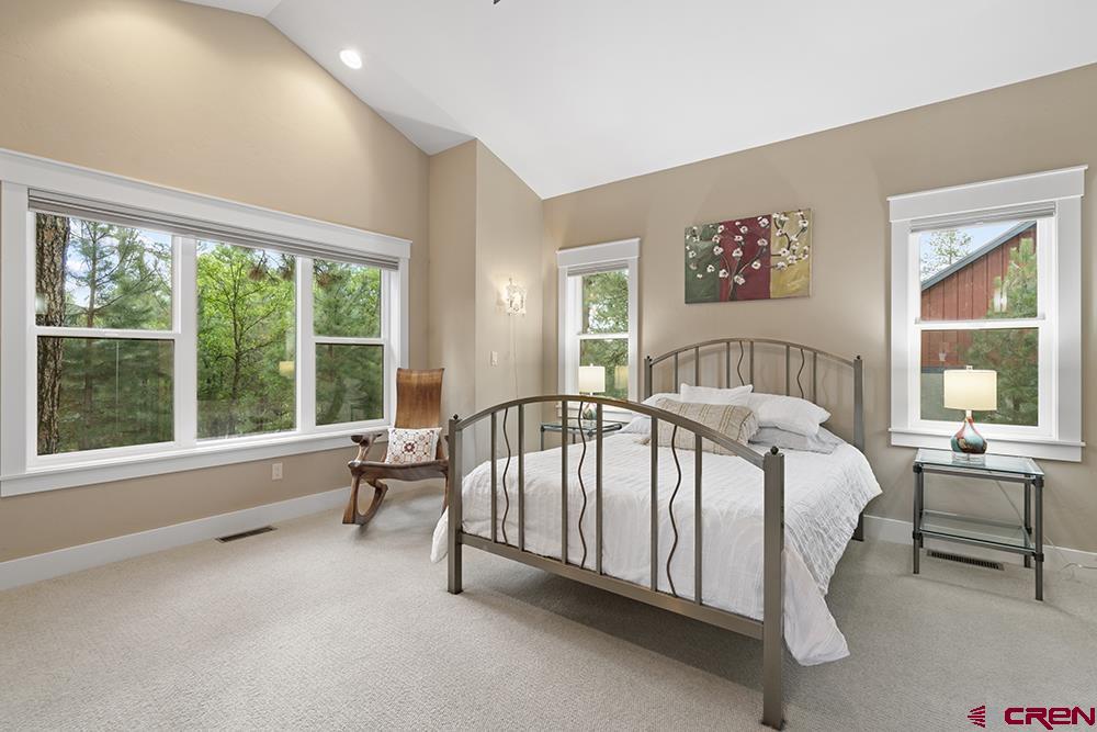 322 Window Lake Trail Durango, CO 81301 - Photo 23 of 35 a bed sitting in a bedroom next to a window