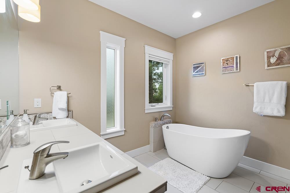 322 Window Lake Trail Durango, CO 81301 - Photo 27 of 35 a bathroom with a bathtub and sink
