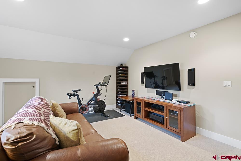 322 Window Lake Trail Durango, CO 81301 - Photo 29 of 35 a living room with furniture and a flat screen tv