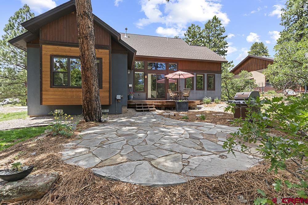 322 Window Lake Trail Durango, CO 81301 - Photo 5 of 35 a view of a house with backyard porch and sitting area
