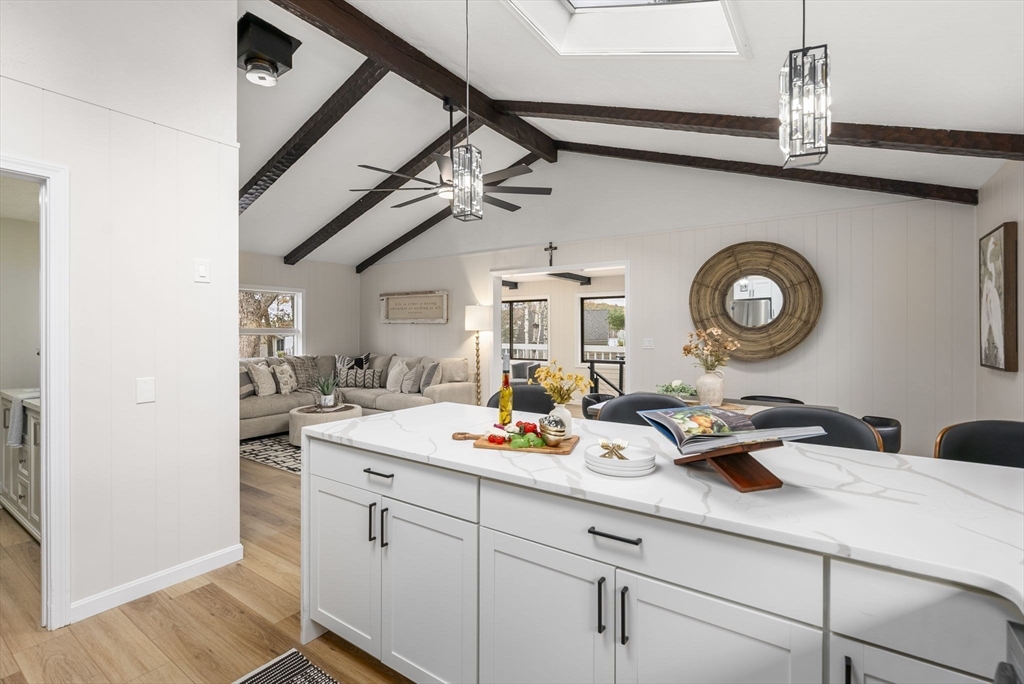 6 Henry Road Webster, MA 01570 - Photo 11 of 39 a close view of sink storage and wooden floor