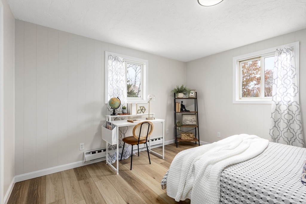 6 Henry Road Webster, MA 01570 - Photo 13 of 39 a bedroom with a bed and a window