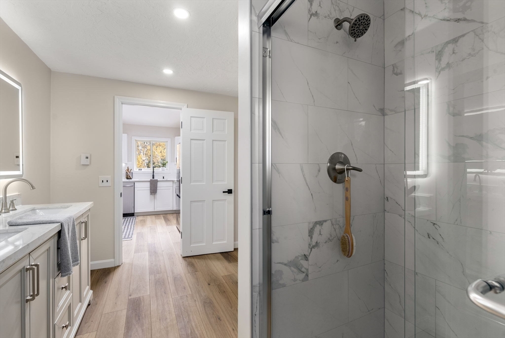 6 Henry Road Webster, MA 01570 - Photo 18 of 39 a bathroom with a sink and shower