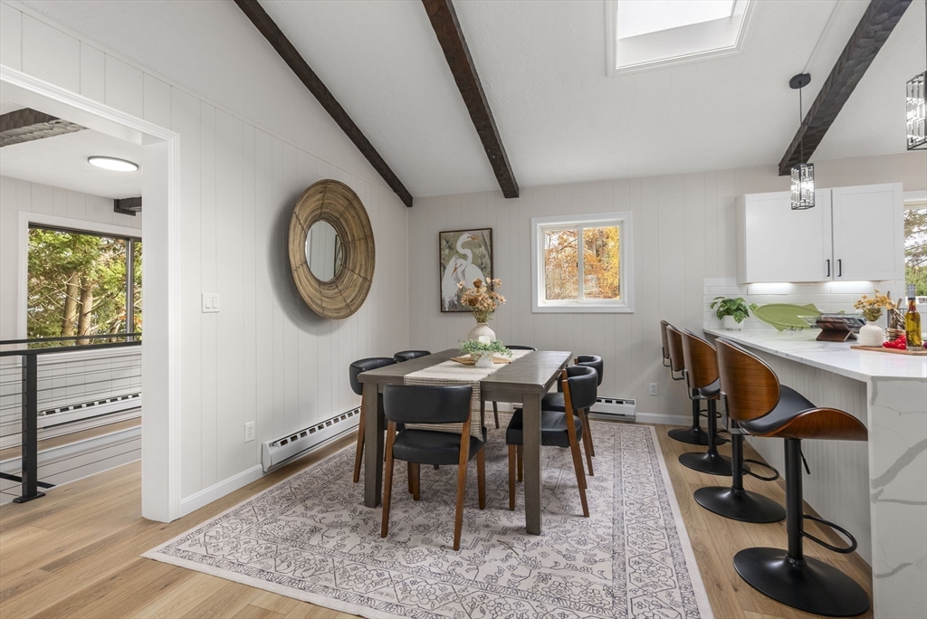 6 Henry Road Webster, MA 01570 - Photo 19 of 39 a view of a dining room with furniture and wooden floor