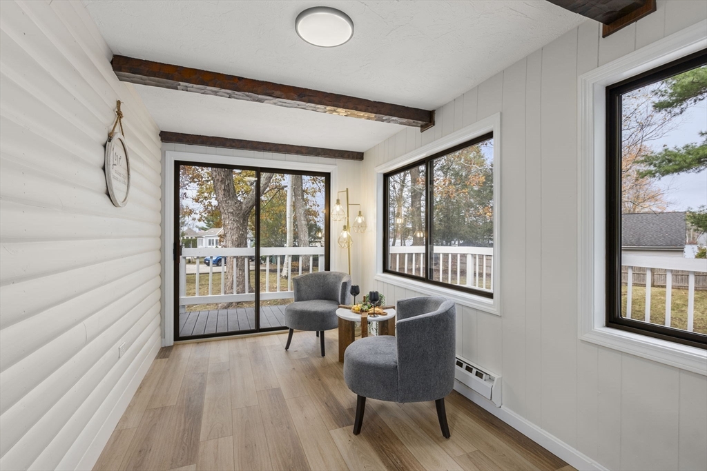 6 Henry Road Webster, MA 01570 - Photo 21 of 39 a living room with furniture and a window