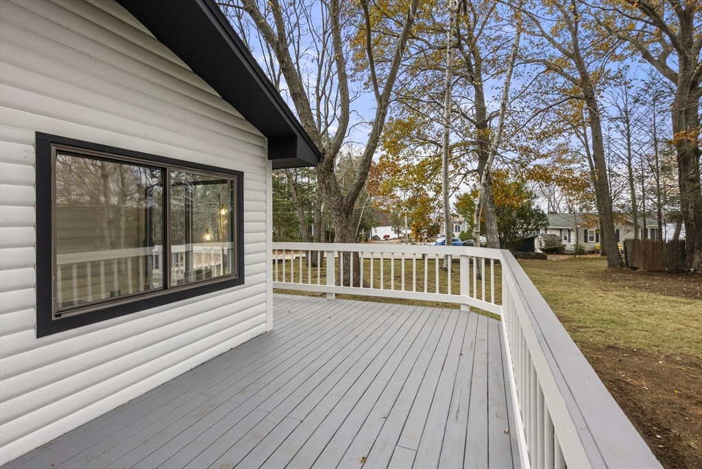 6 Henry Road Webster, MA 01570 - Photo 29 of 39 a view of a balcony with wooden floor