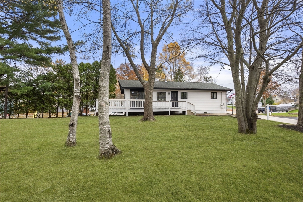 6 Henry Road Webster, MA 01570 - Photo 33 of 39 a view of a house with a yard