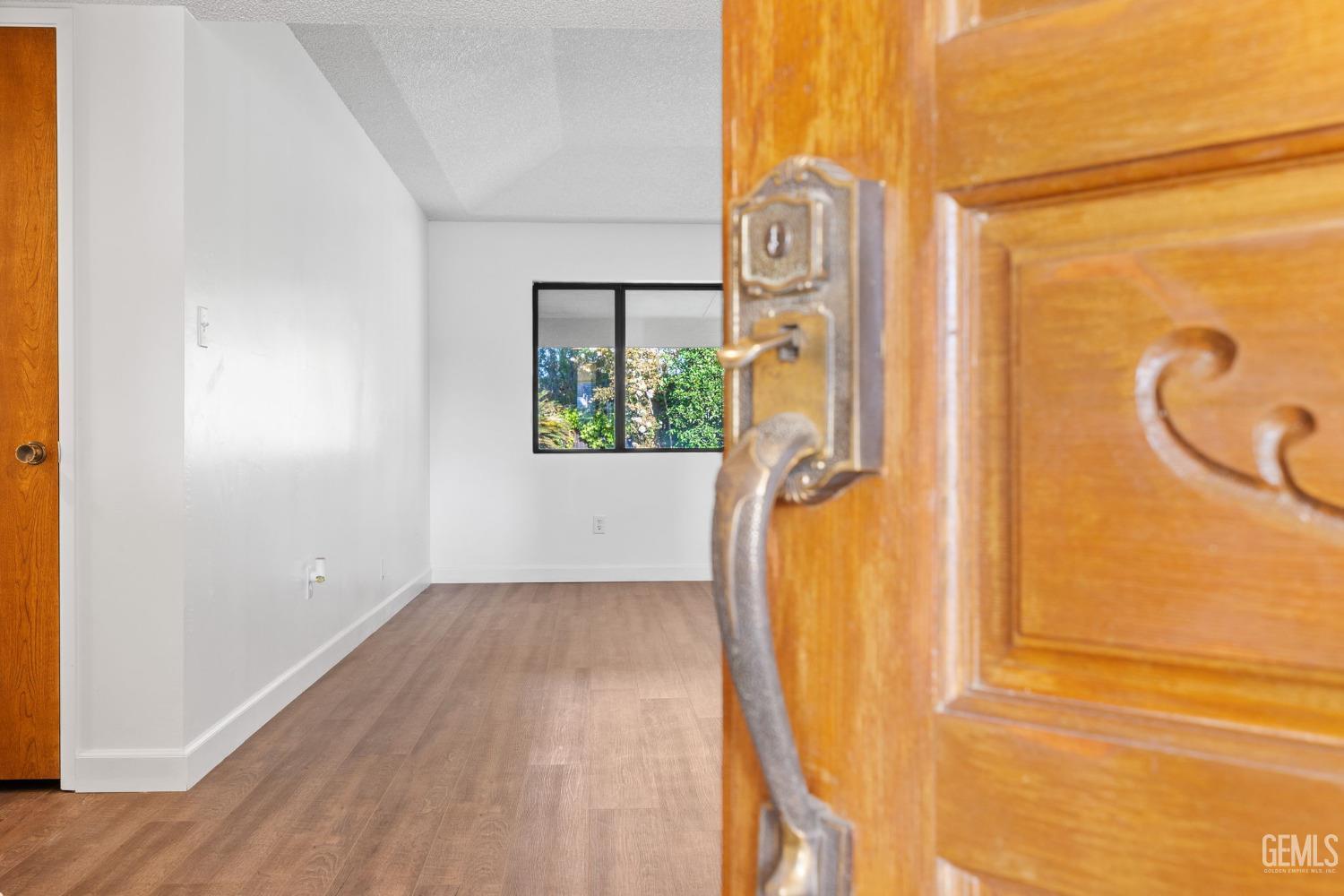 Undisclosed Address Bakersfield, CA 93314 - Photo 12 of 60 a view of a bathroom with a tub and a window