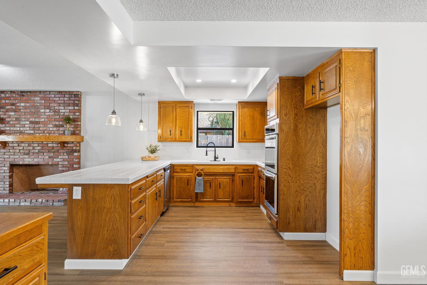 Undisclosed Address Bakersfield, CA 93314 - Photo 28 of 60 a large bathroom with a large tub and sink
