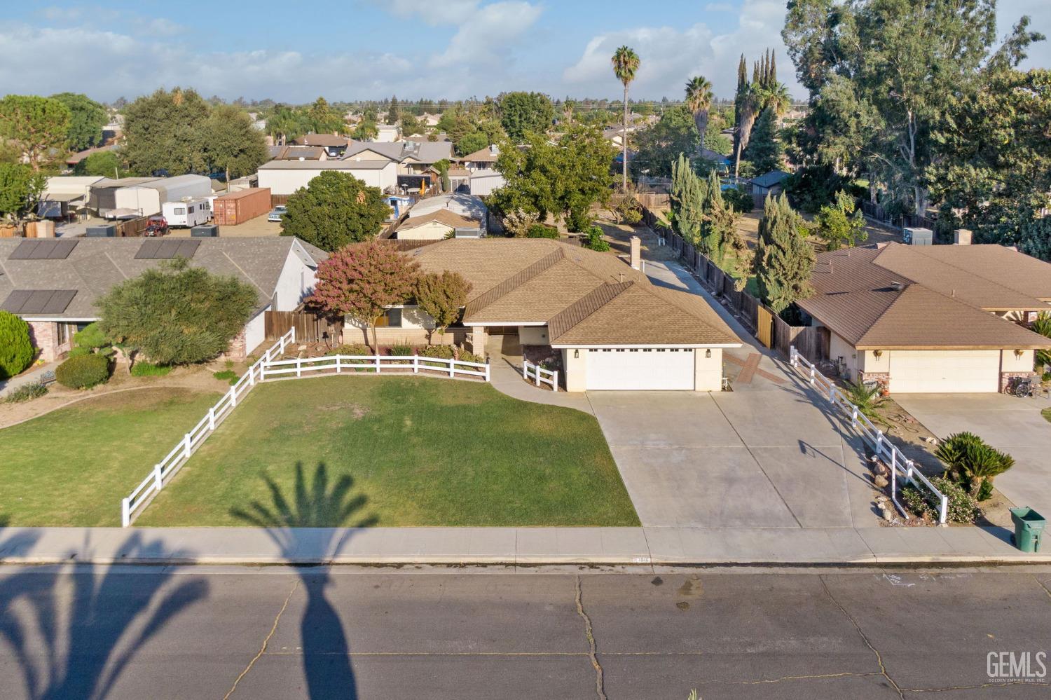 Undisclosed Address Bakersfield, CA 93314 - Photo 3 of 60 an aerial view of a house
