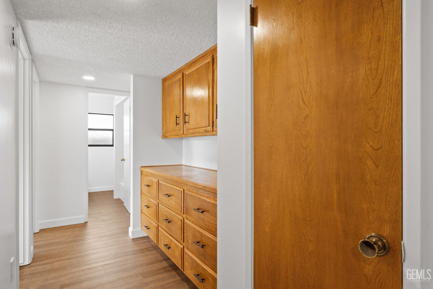 Undisclosed Address Bakersfield, CA 93314 - Photo 32 of 60 a bathroom with a sink a mirror and a shower