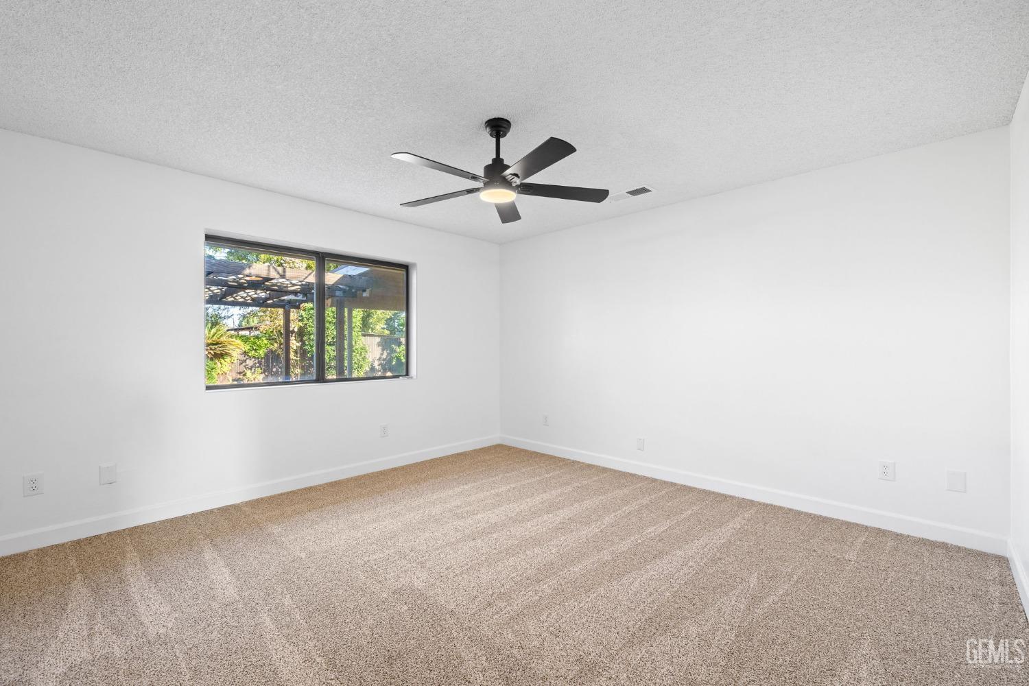 Undisclosed Address Bakersfield, CA 93314 - Photo 34 of 60 wooden floor in an empty room with a window