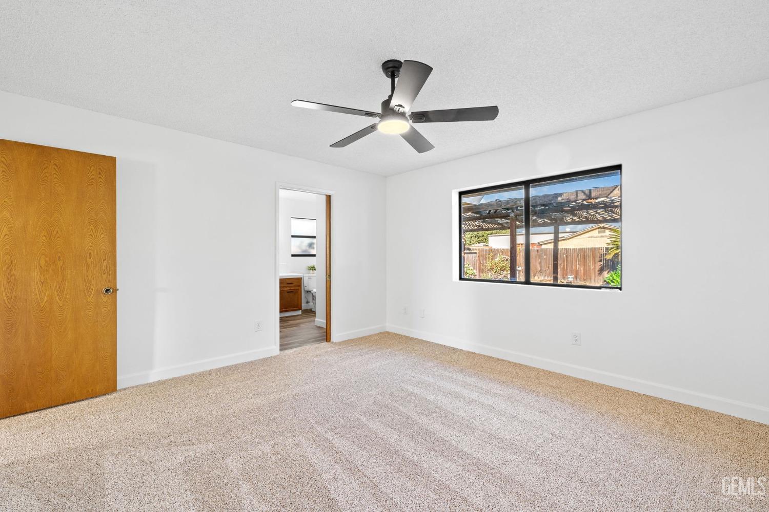 Undisclosed Address Bakersfield, CA 93314 - Photo 37 of 60 a view of an empty room with a window