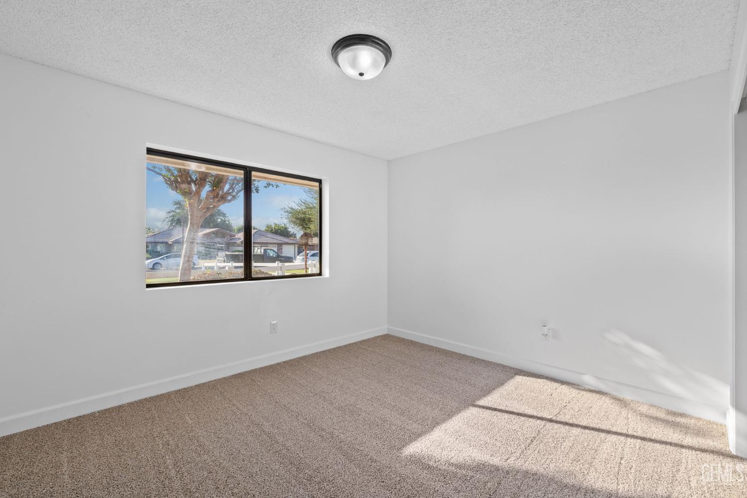 Undisclosed Address Bakersfield, CA 93314 - Photo 43 of 60 an empty room with a window