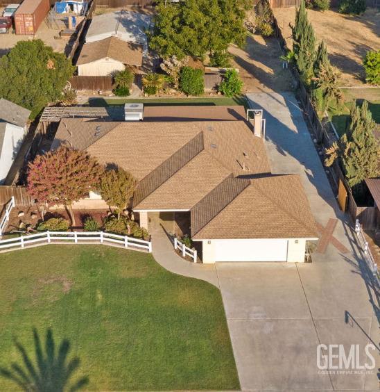 Undisclosed Address Bakersfield, CA 93314 - Photo 5 of 60 an aerial view of residential houses with outdoor space