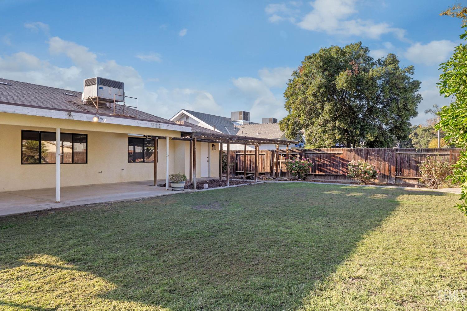 Undisclosed Address Bakersfield, CA 93314 - Photo 53 of 60 a front view of a house with garden
