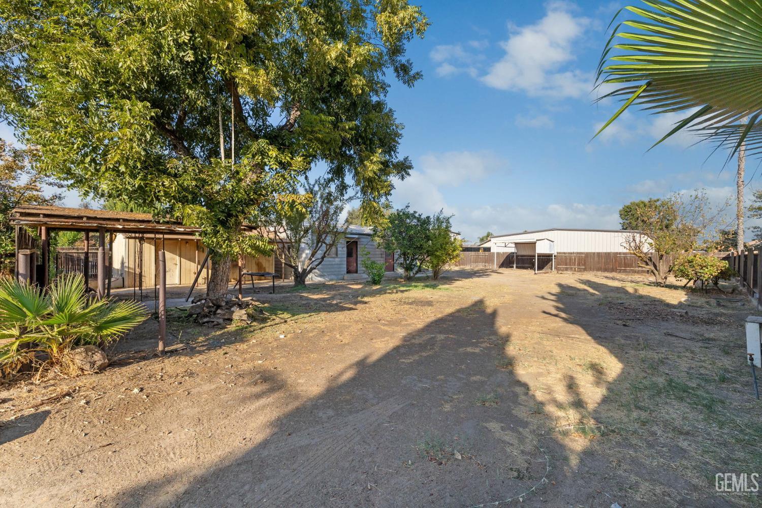 Undisclosed Address Bakersfield, CA 93314 - Photo 54 of 60 a view of swimming pool with a patio