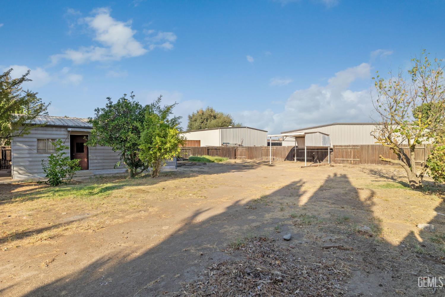 Undisclosed Address Bakersfield, CA 93314 - Photo 55 of 60 a view of a house with snow on the road