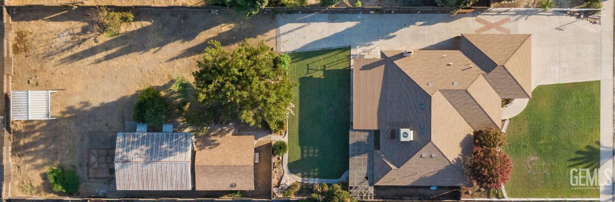 Undisclosed Address Bakersfield, CA 93314 - Photo 60 of 60 an aerial view of a house with a yard