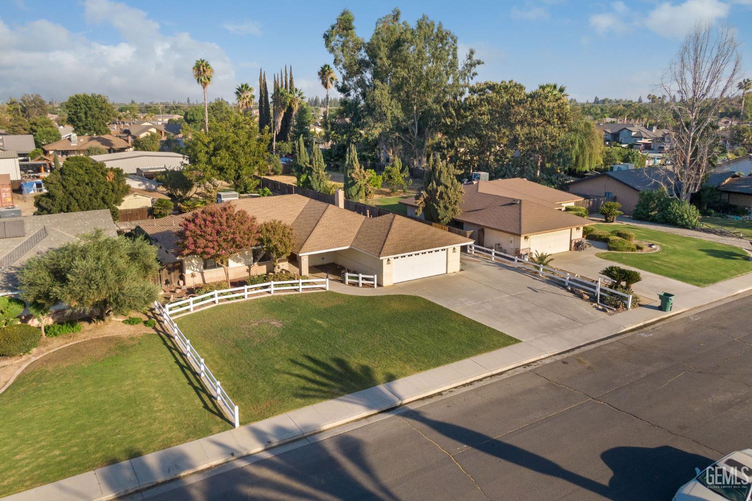 Undisclosed Address Bakersfield, CA 93314 - Photo 6 of 60 an aerial view of a house having outdoor space