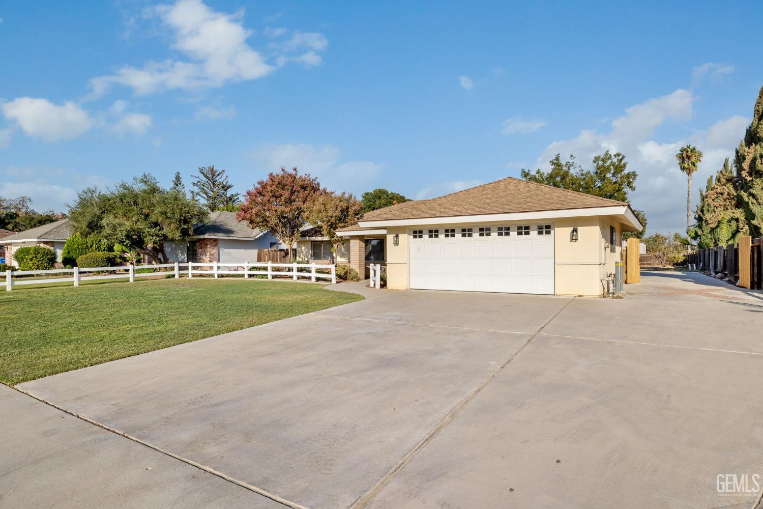 Undisclosed Address Bakersfield, CA 93314 - Photo 8 of 60 a sign board with a big yard