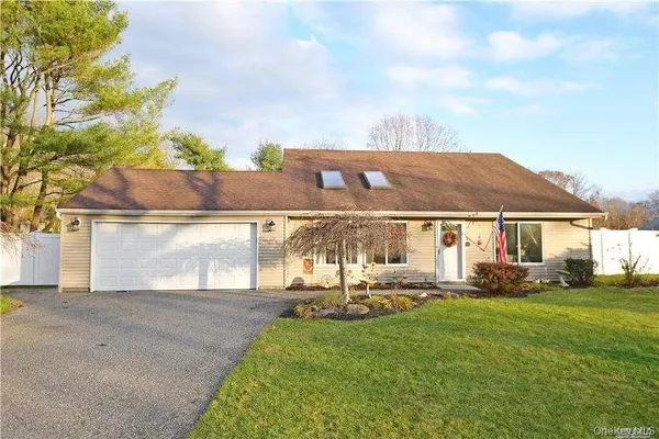 a front view of house with yard