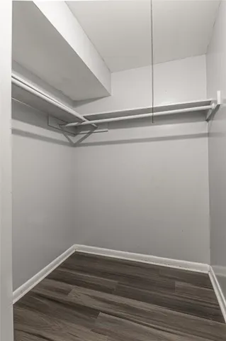 a view of an empty walk in closet