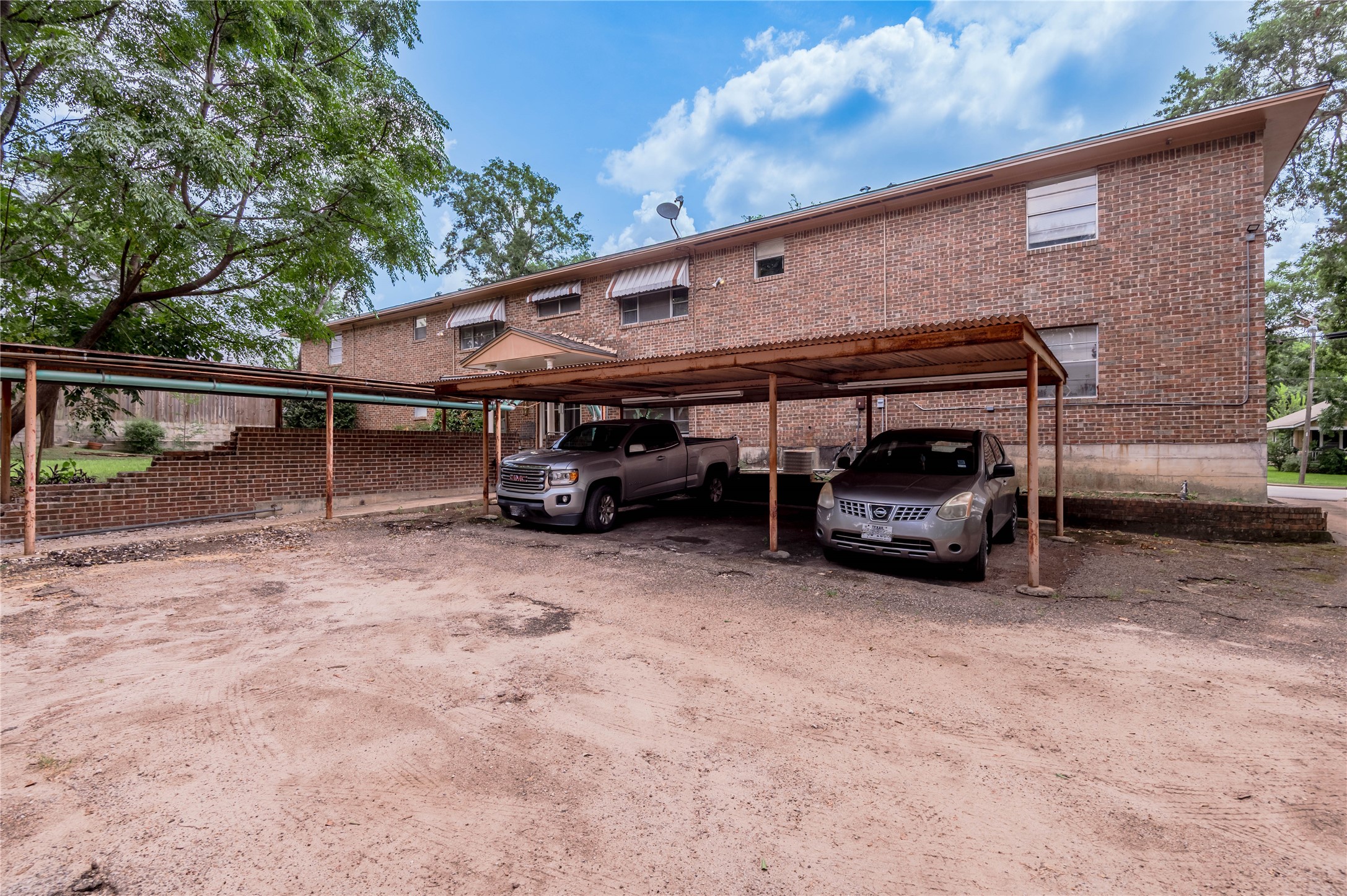 818 University Avenue, Unit 8 Huntsville, TX 77320 - Photo 20 of 22 a view of a car garage