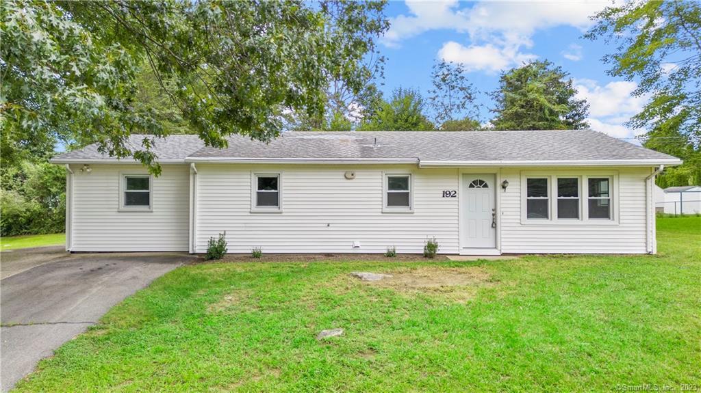 192 Kimball Road Lisbon, CT 06351 - Photo 1 of 1 a view of a white house in front of a big yard with large trees