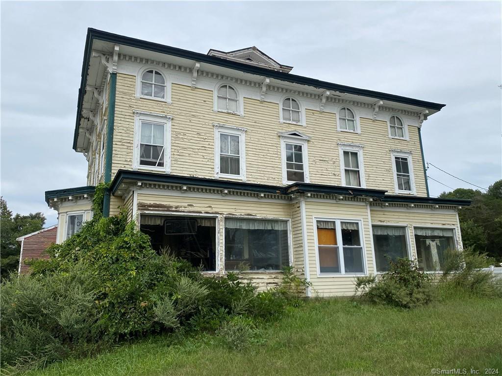 7 Baltic Road Franklin, CT 06254 - Photo 1 of 1 a front view of a house with a yard